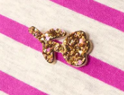 Omael Broche